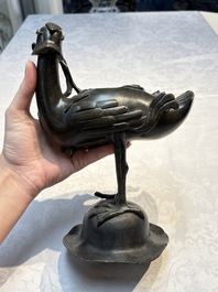 A pair of Chinese bronze duck-form censers, 17/18th C.