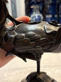 A pair of Chinese bronze duck-form censers, 17/18th C.