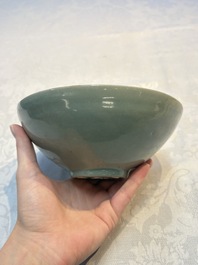 A fine Korean celadon moulded 'Peony Scroll' bowl with a wooden box, Goryeo, 13th C.