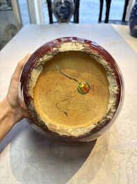 A pair of Chinese flamb&eacute;-glazed jars and covers, 19th C.