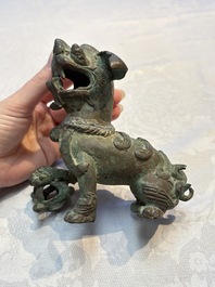 A pair of Vietnamese bronze lions, 19/20th C.