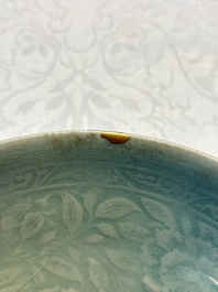 A fine Korean celadon moulded 'Peony Scroll' bowl with a wooden box, Goryeo, 13th C.
