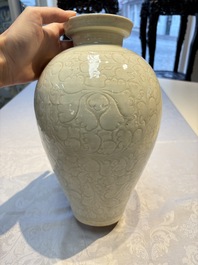 A Chinese qingbai 'Meiping' vase with incised floral design, Yuan or later