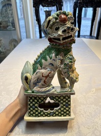 A pair of Chinese verte biscuit models of Buddhist lions, 18th C.