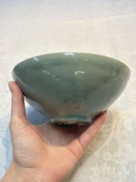 A fine Korean celadon moulded 'Peony Scroll' bowl with a wooden box, Goryeo, 13th C.