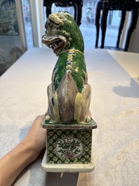 A pair of Chinese verte biscuit models of Buddhist lions, 18th C.