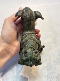 A pair of Vietnamese bronze lions, 19/20th C.