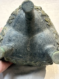 A Chinese archaic bronze food vessel with Taotie design, 'Ding 鼎', late Shang