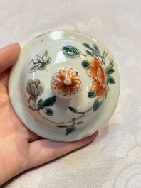 A pair of Chinese famille verte covered jars, a Tieguai Li figure, a blue and white teapot and a biscuit saucer, Kangxi and Qing Yu Tang mark, 19th C.