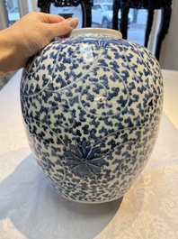 A Chinese blue and white 'Lotus Scroll' vase, 19th C.