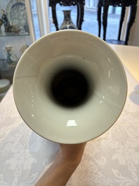 Two Chinese famille rose 'Elegant Beauties' vases, one with a Guan Yao Nei Zao 官窯內造 mark, signed Luo Su Shi 羅宿氏 and dated 1931, the other 19th C.