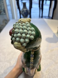 A pair of Chinese verte biscuit models of Buddhist lions, 18th C.