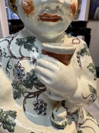 A massive polychrome French faience 'Bacchus' table fountain, Rouen, 18th C.