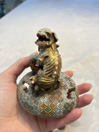 A Japanese Satsuma koro and two covered boxes, Satsuma yaki, Kusube and Hododa mark, Meiji, 19th C.