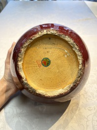 A pair of Chinese flamb&eacute;-glazed jars and covers, 19th C.