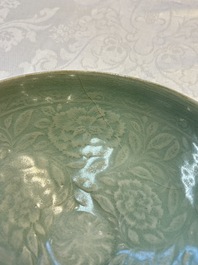 A fine Korean celadon moulded 'Peony Scroll' bowl with a wooden box, Goryeo, 13th C.