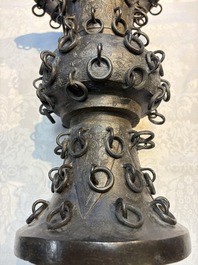 A Chinese archaistic bronze 'Zun' vase with 99 rings, 18/19th C.