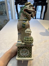 A pair of Chinese verte biscuit models of Buddhist lions, 18th C.