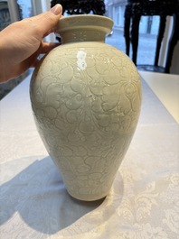 A Chinese qingbai 'Meiping' vase with incised floral design, Yuan or later