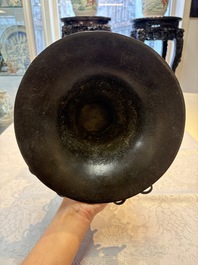 A Chinese archaistic bronze 'Zun' vase with 99 rings, 18/19th C.