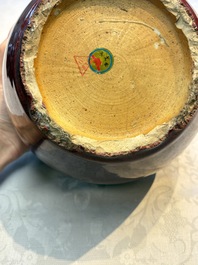 A pair of Chinese flamb&eacute;-glazed jars and covers, 19th C.