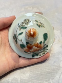 A pair of Chinese famille verte covered jars, a Tieguai Li figure, a blue and white teapot and a biscuit saucer, Kangxi and Qing Yu Tang mark, 19th C.