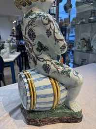 A massive polychrome French faience 'Bacchus' table fountain, Rouen, 18th C.