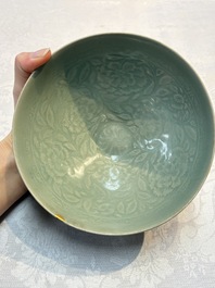 A fine Korean celadon moulded 'Peony Scroll' bowl with a wooden box, Goryeo, 13th C.