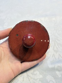 A pair of Chinese flamb&eacute;-glazed jars and covers, 19th C.