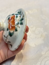 A pair of Chinese famille verte covered jars, a Tieguai Li figure, a blue and white teapot and a biscuit saucer, Kangxi and Qing Yu Tang mark, 19th C.