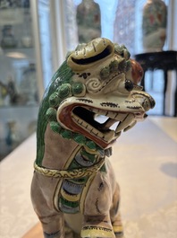 A pair of Chinese verte biscuit models of Buddhist lions, 18th C.