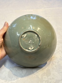 A fine Korean celadon moulded 'Peony Scroll' bowl with a wooden box, Goryeo, 13th C.