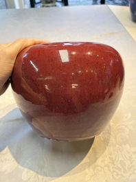 A pair of Chinese flamb&eacute;-glazed jars and covers, 19th C.