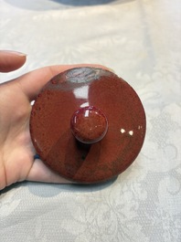 A pair of Chinese flamb&eacute;-glazed jars and covers, 19th C.