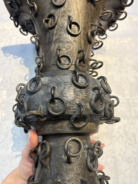 A Chinese archaistic bronze 'Zun' vase with 99 rings, 18/19th C.