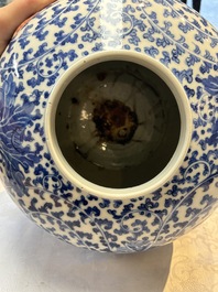 A Chinese blue and white 'Lotus Scroll' vase, 19th C.