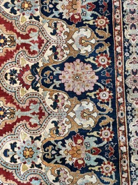 An exceptional and large embroidered silk 'Shahnameh' carpet, signed Musa Baft Tabriz, Tabriz, Iran, 20th C.