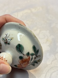 A pair of Chinese famille verte covered jars, a Tieguai Li figure, a blue and white teapot and a biscuit saucer, Kangxi and Qing Yu Tang mark, 19th C.