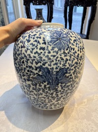A Chinese blue and white 'Lotus Scroll' vase, 19th C.