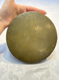 Two Chinese bronze mirrors, one inscribed &lsquo;Fu Shan Shou Hai 福山壽海' and the other with sea animals and grape design, Qing