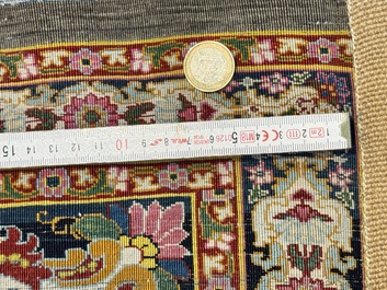 An exceptional and large embroidered silk 'Shahnameh' carpet, signed Musa Baft Tabriz, Tabriz, Iran, 20th C.