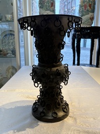 A Chinese archaistic bronze 'Zun' vase with 99 rings, 18/19th C.