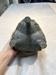 A Chinese archaic bronze food vessel with Taotie design, 'Ding 鼎', late Shang