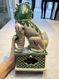 A pair of Chinese verte biscuit models of Buddhist lions, 18th C.