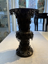 A Chinese archaistic bronze 'Zun' vase with 99 rings, 18/19th C.