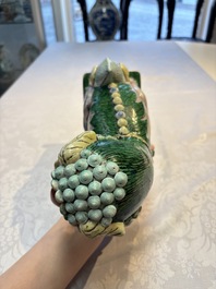 A pair of Chinese verte biscuit models of Buddhist lions, 18th C.