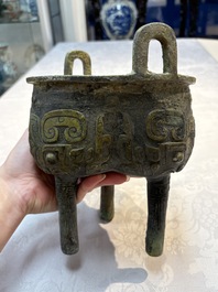 A Chinese archaic bronze food vessel with Taotie design, 'Ding 鼎', late Shang