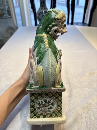 A pair of Chinese verte biscuit models of Buddhist lions, 18th C.