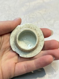 A pair of Chinese famille verte covered jars, a Tieguai Li figure, a blue and white teapot and a biscuit saucer, Kangxi and Qing Yu Tang mark, 19th C.