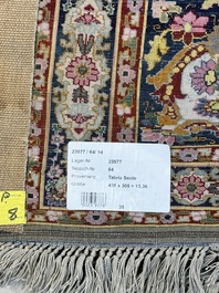 An exceptional and large embroidered silk 'Shahnameh' carpet, signed Musa Baft Tabriz, Tabriz, Iran, 20th C.